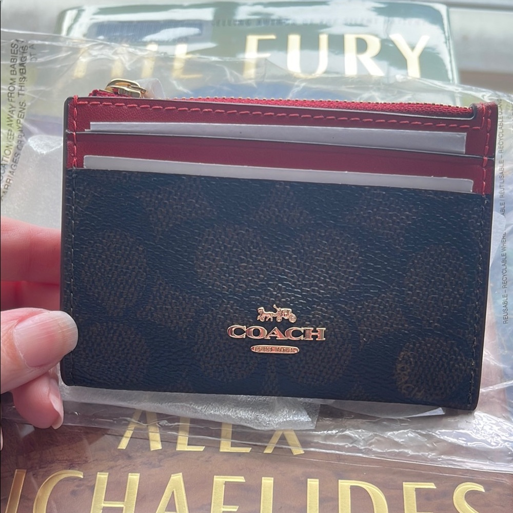 Coach Brown and Red Key Card Holder Sleek Design